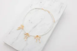 Halskæde perler og sløjfer - guld| Smykker & Hårpynt